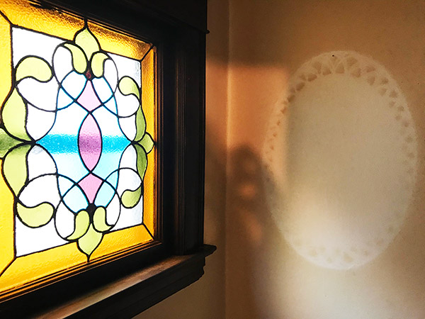 minneapolis-mn-stained glass-window-and-doily